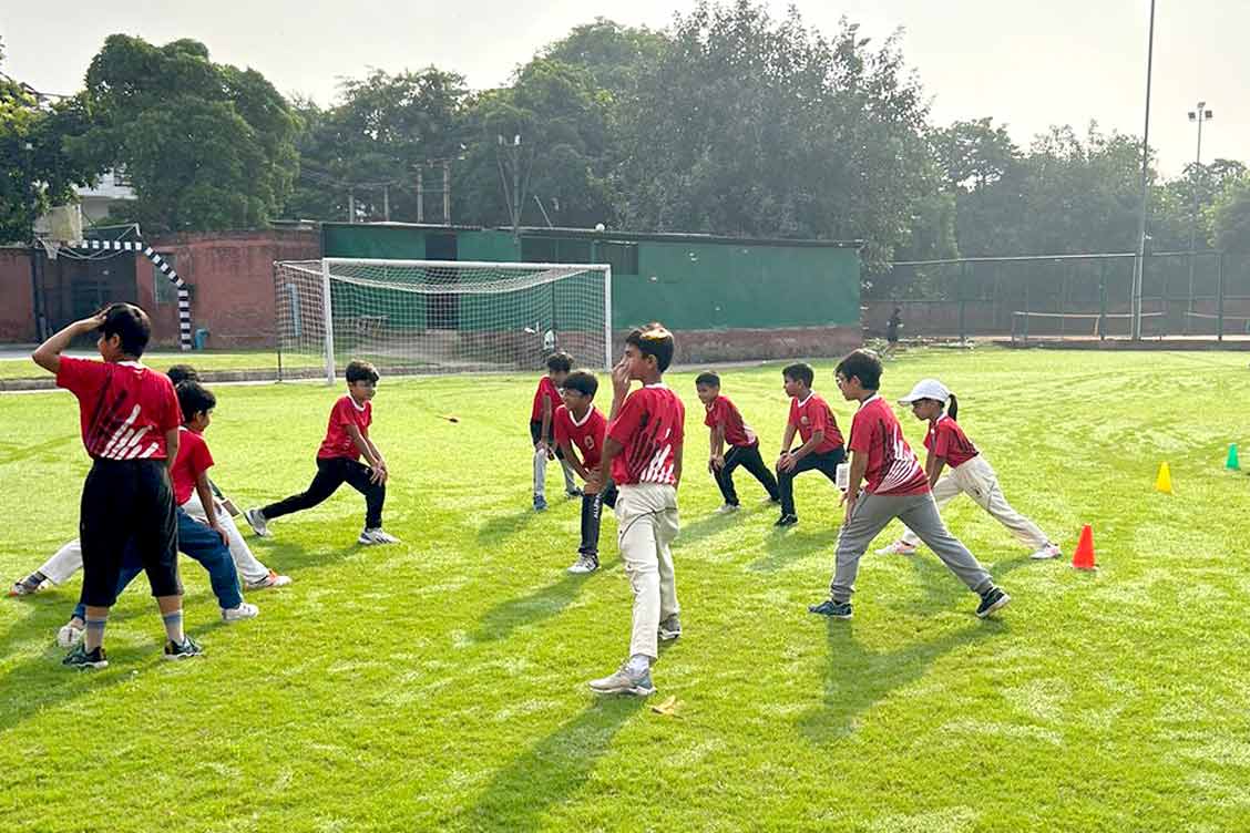 Excitement Soars at The Khaitan School's Inter-House Cricket Tournament Final- Warm up before the match